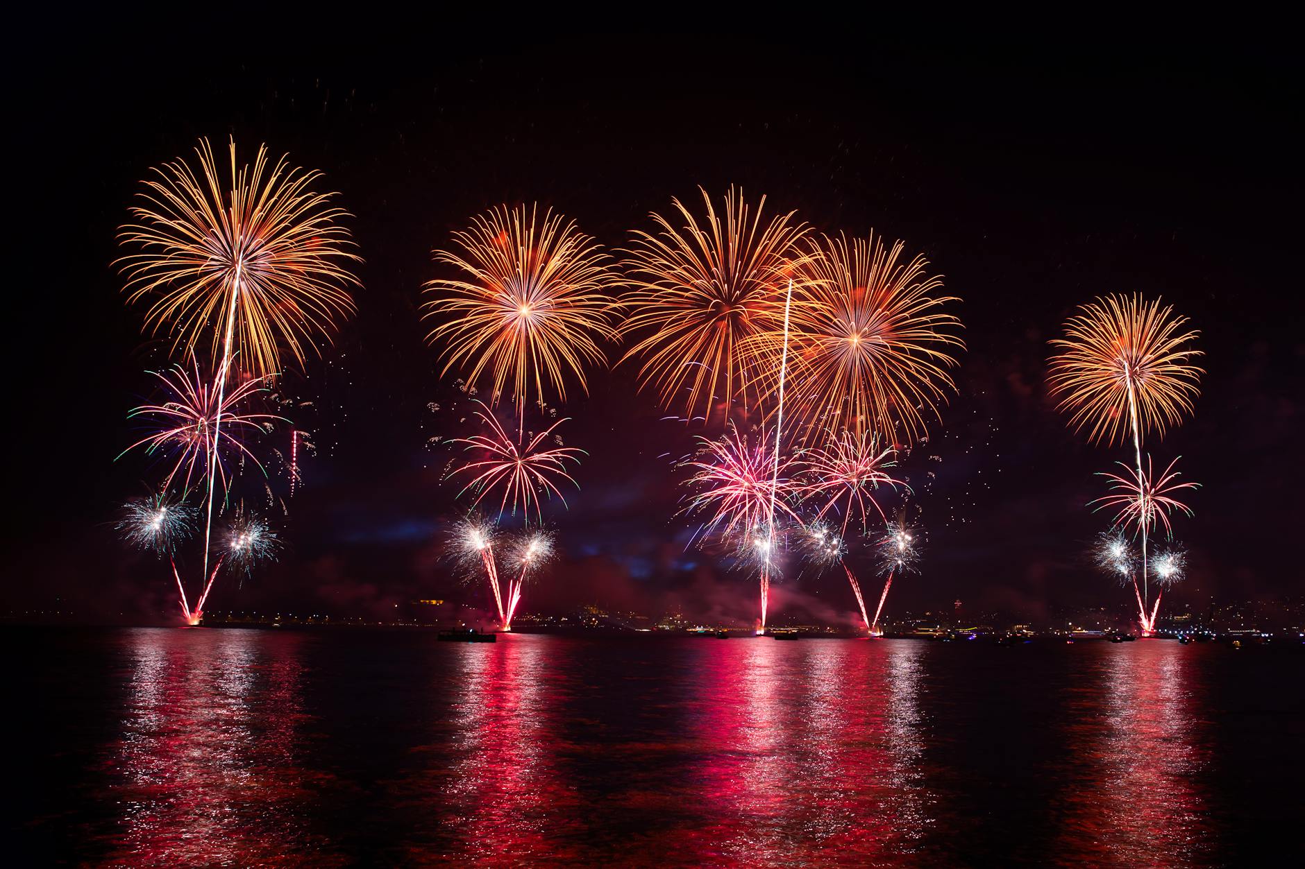 Spectacular fireworks lighting up the Key West night sky over the waterfront