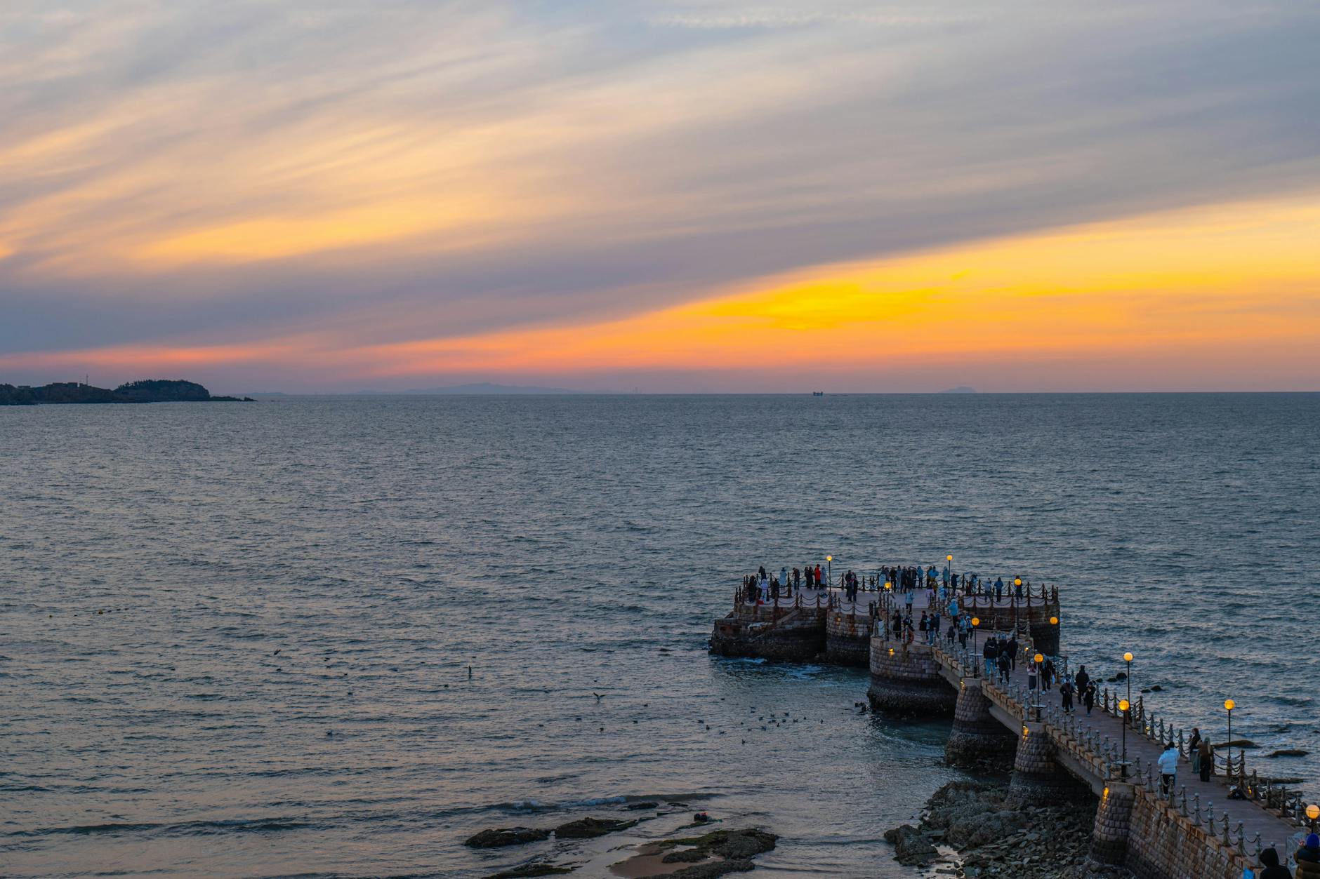 Sunset celebration at the Key West waterfront drawing crowds for a festival event