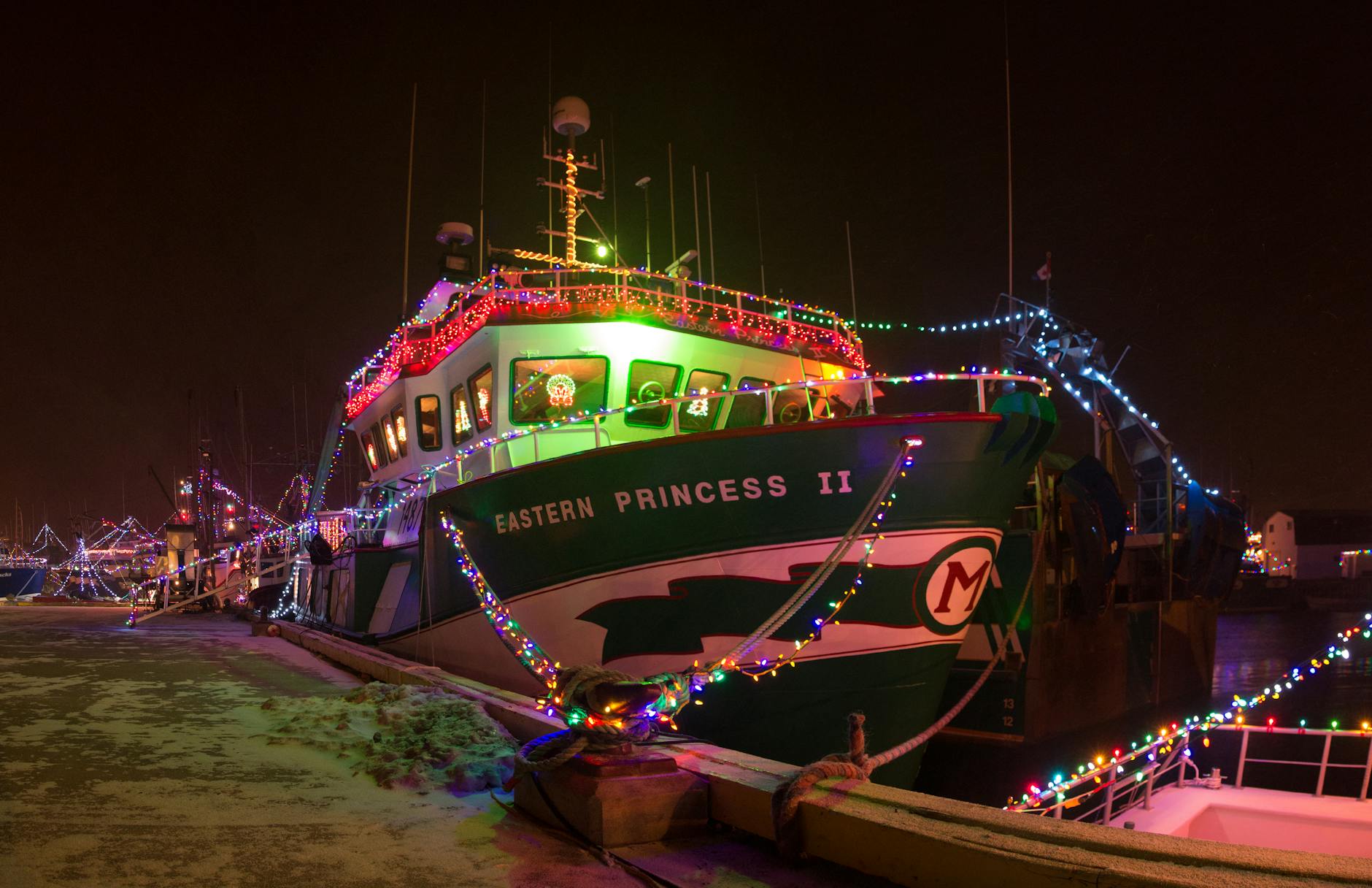 Decorated boats in Key West harbor during an annual maritime festival