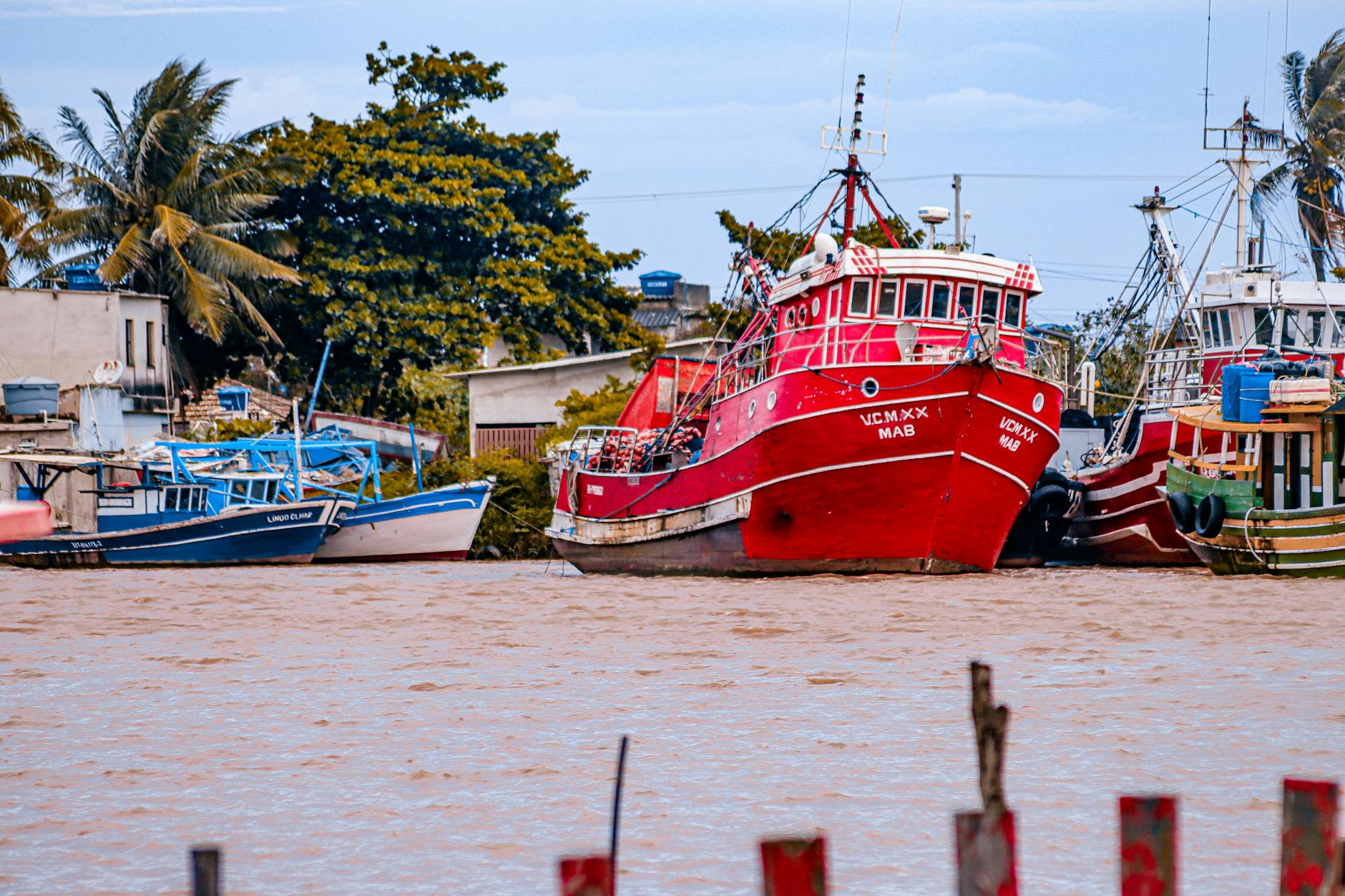 Fishing charter boats docked at a tropical marina — Key West fishing charter fleet