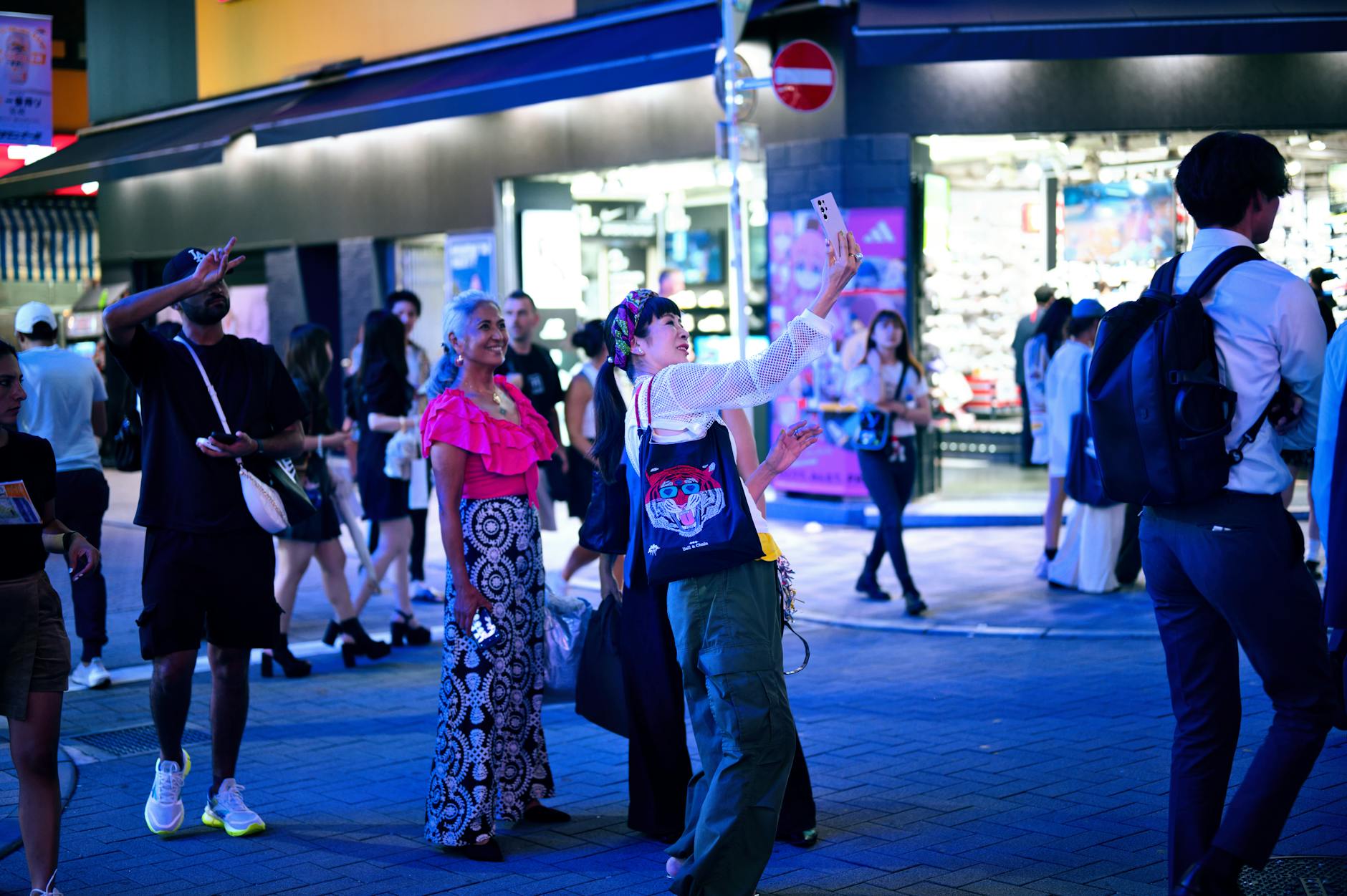 Visitors enjoying the energetic nightlife along Key West streets