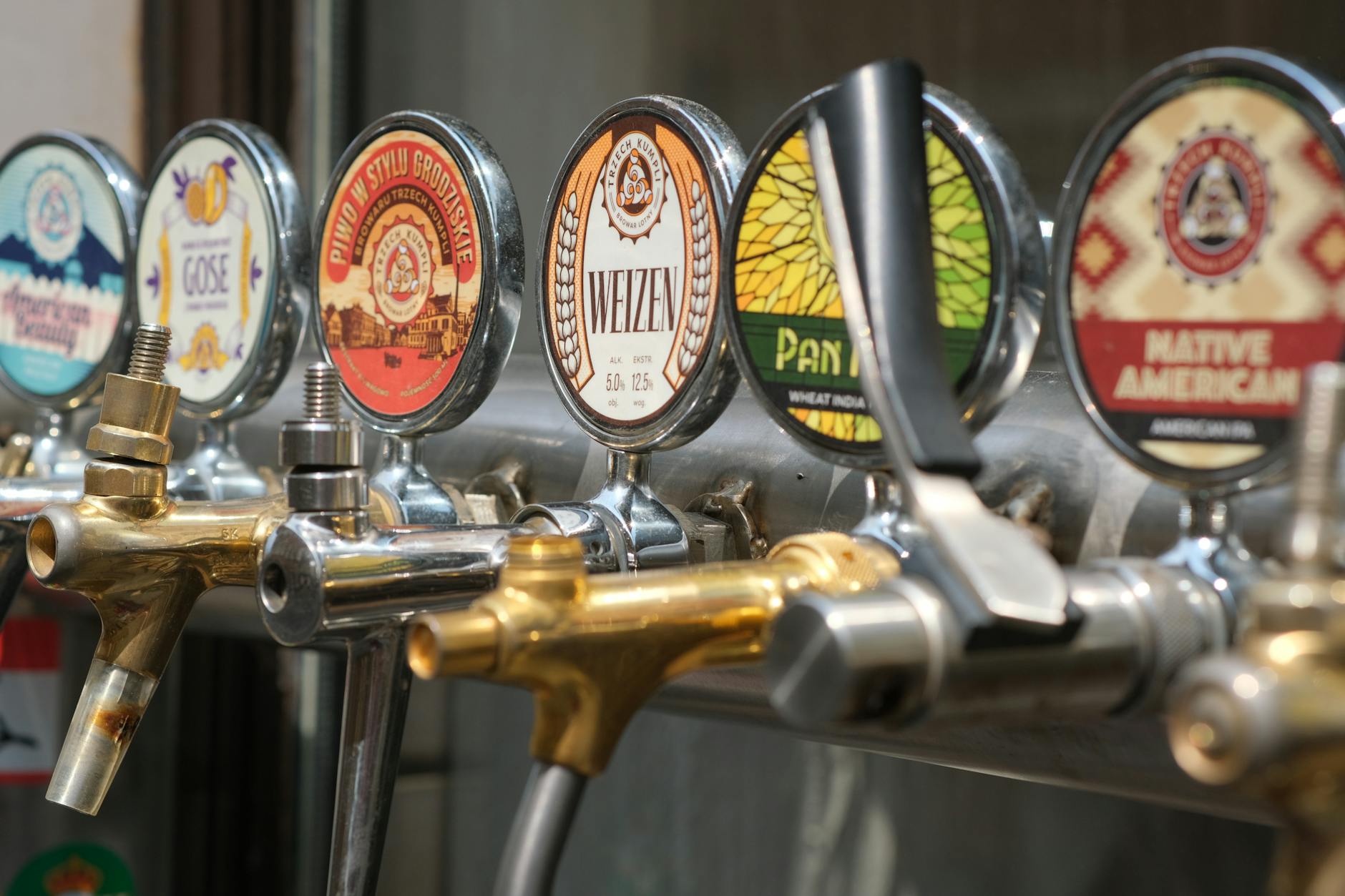 Craft beer taps at a Key West brewery showcasing local brews