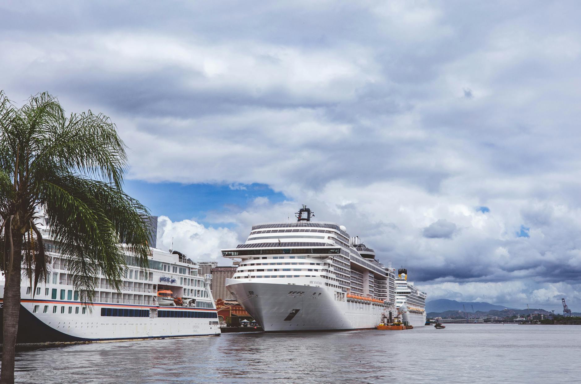 Cruise ship docked at a tropical port similar to Key West harbor