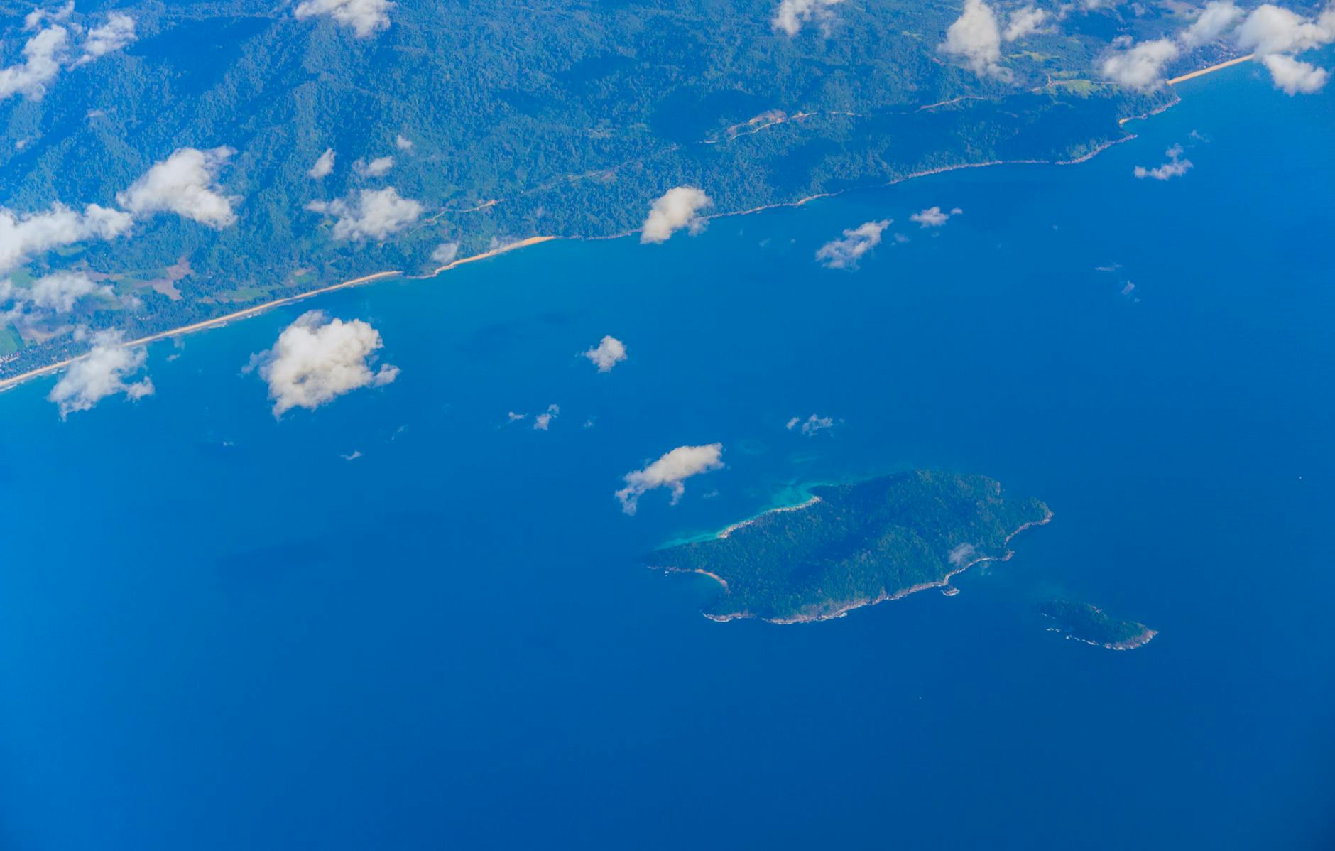 Aerial view of a tropical island surrounded by blue water — Key West vacation planning overview