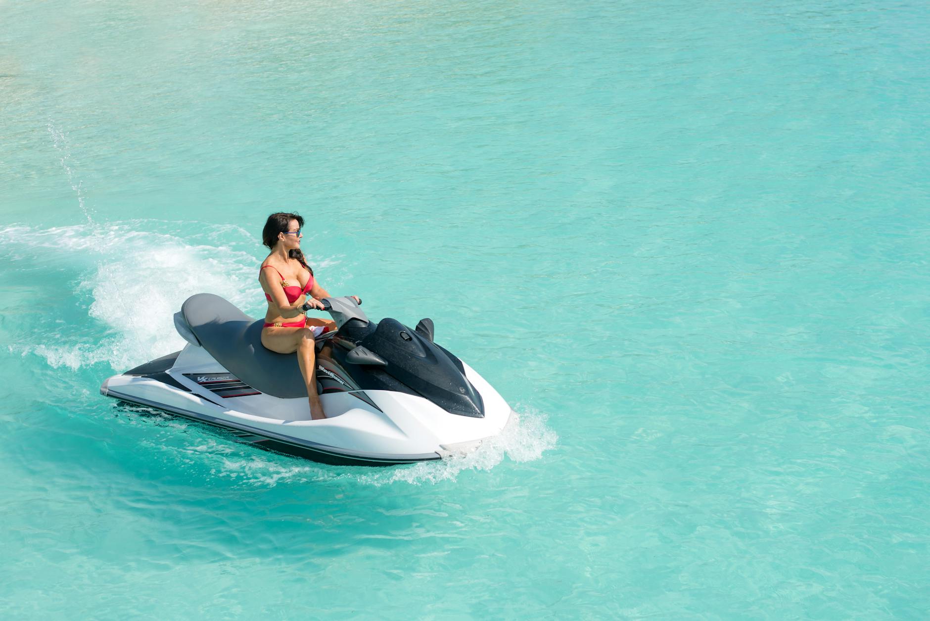 Jet skiing across turquoise ocean water — thrilling Key West water sports