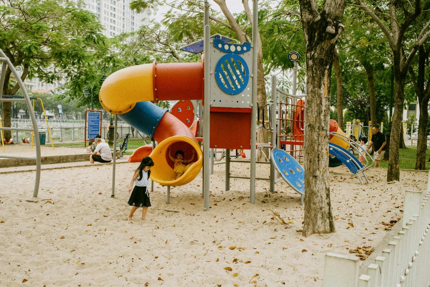 Children playing on a colorful playground for Key West family activities