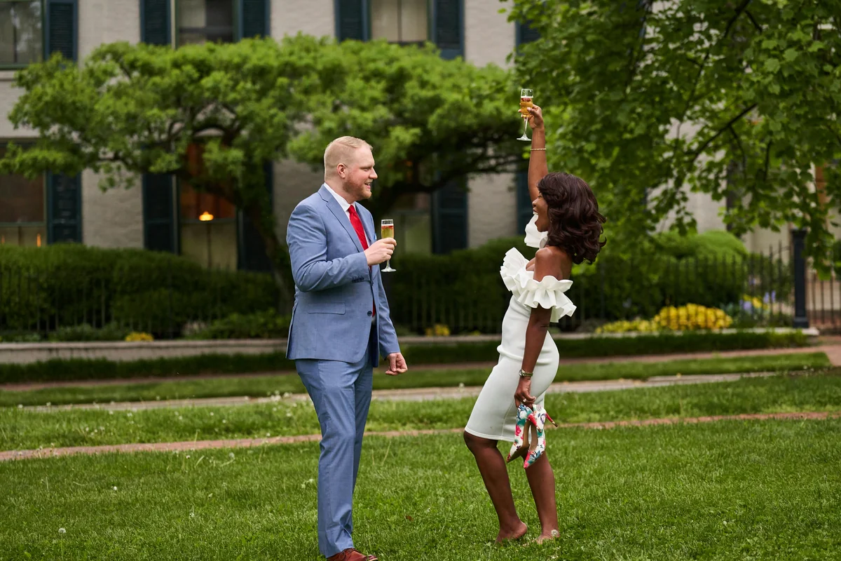 A couple toasting on their honeymoon