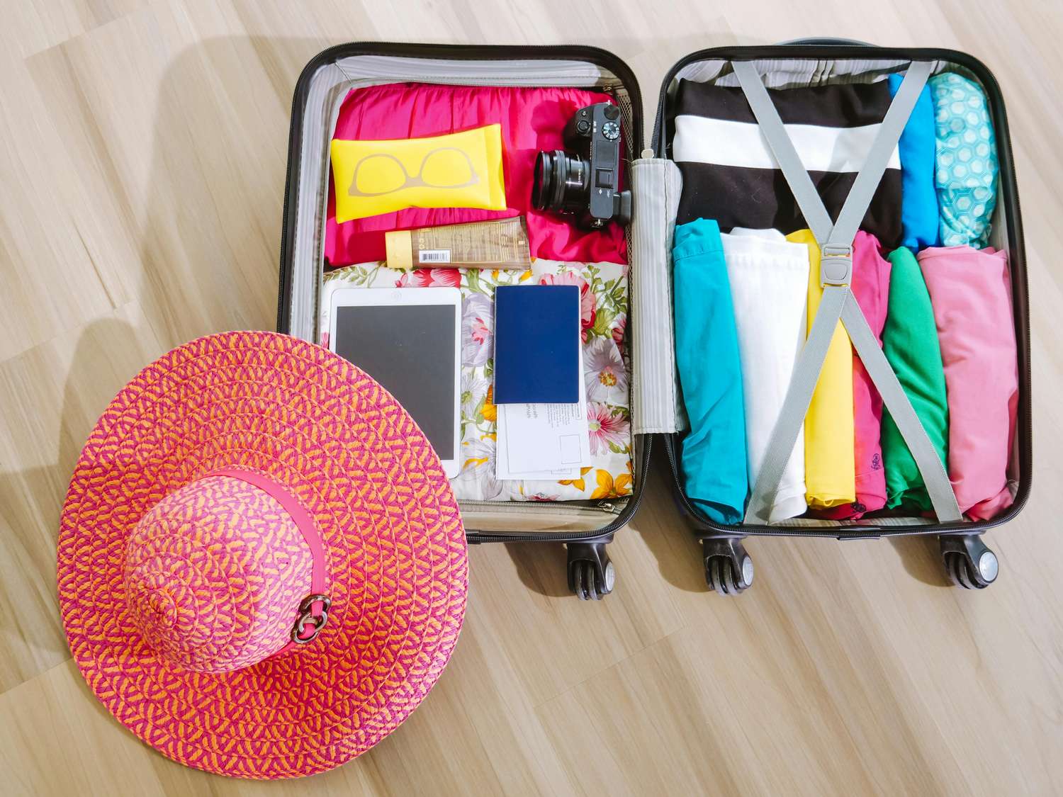 Suitcase packed with travel items for the Key West packing list