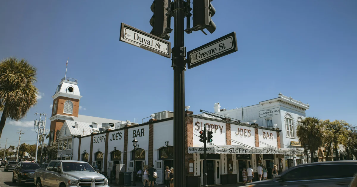Key West pub crawl down Duval Street at night
