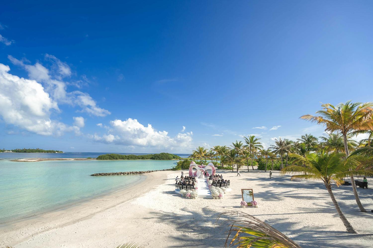 Tropical Key West wedding venues setup with palm trees