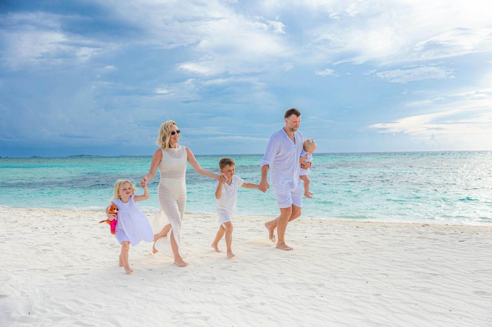 Family enjoying a Key West beach vacation with calm turquoise water